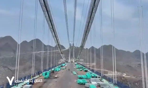 عکس | شکافتن و ایمن‌سازی جالب یک کوه برای ساخت بلندترین پل جهان